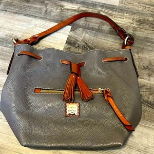Brand new Dooney and Bourke elephant gray draw string bag